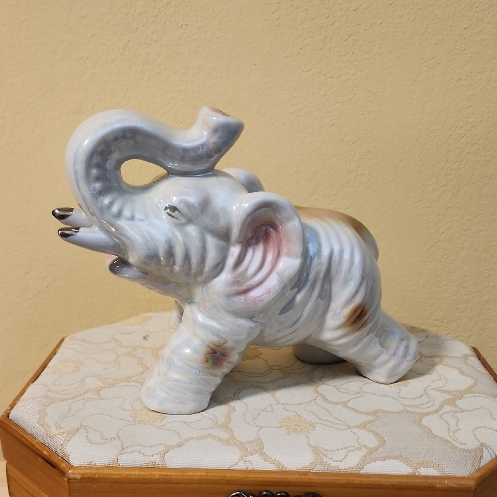 Vintage Ceramic Elephant Figurine With Iridescent Glaze.